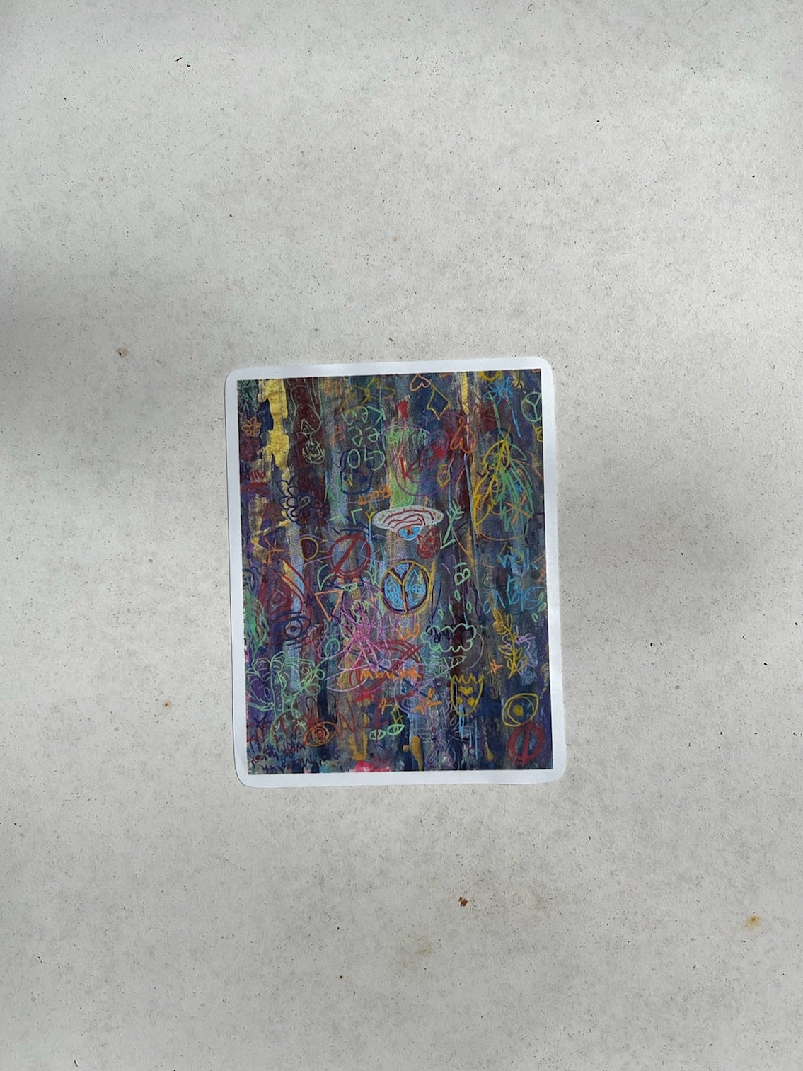 Colorful abstract painting sticker on a white metal sheet