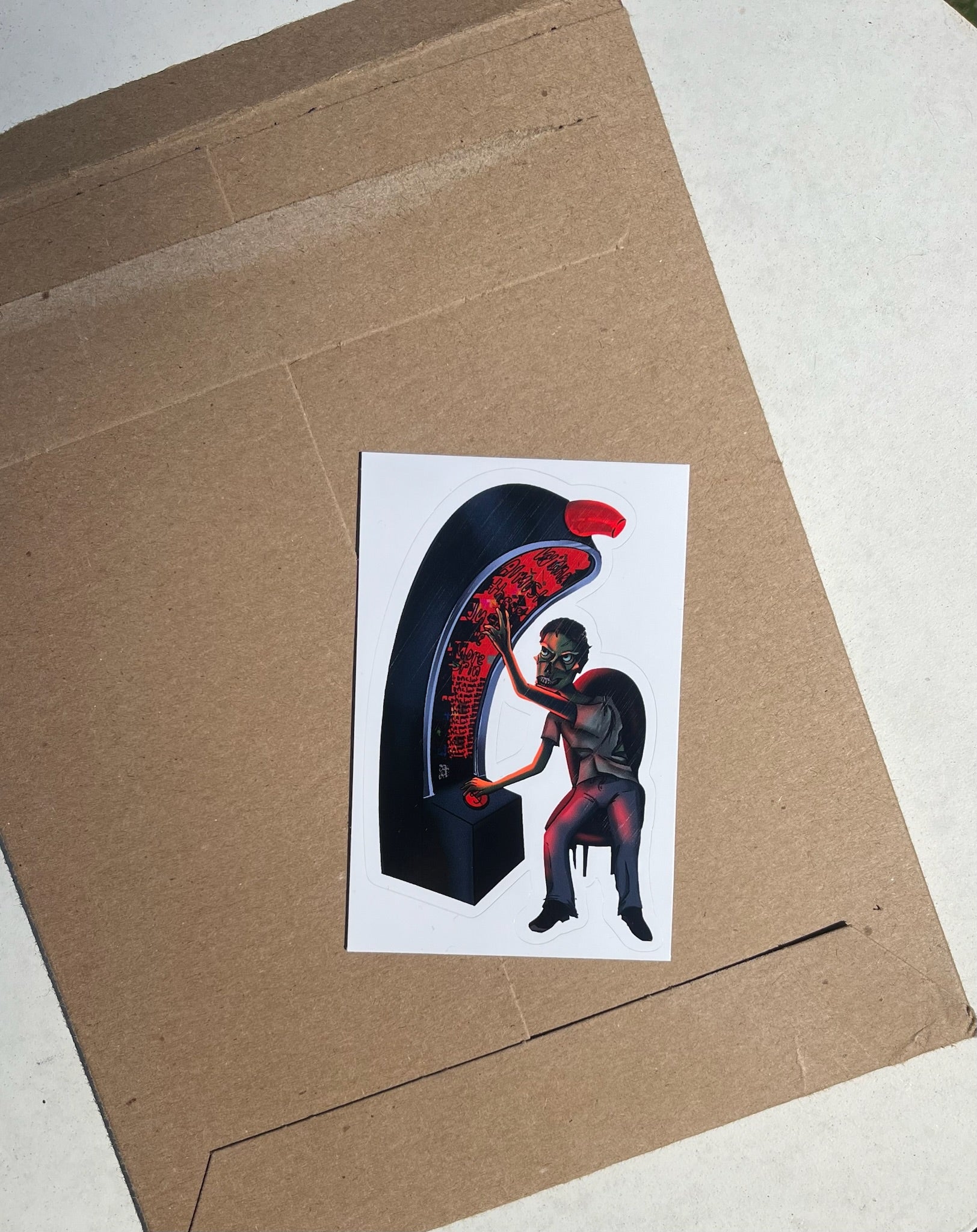 Sticker of a zombie playing a slot machine on a cardboard envelope used for shipping
